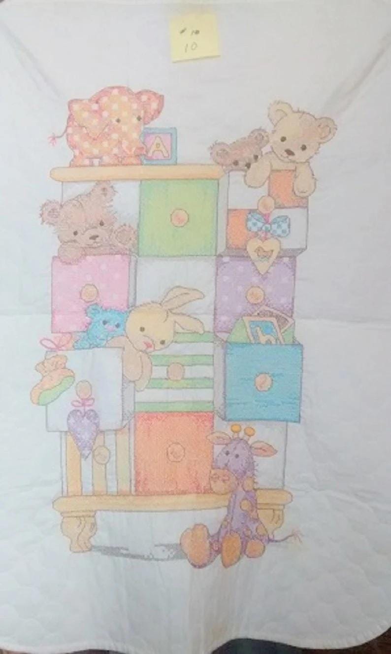 Baby Toys in Dresser Baby Quilt