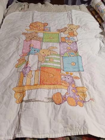 Baby Toys in Dresser Baby Quilt